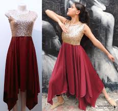 Vestido Elegance Vinho com Dourado Tecido: Helanca e Lantejoulas Dourada Importada Valor: R$140,00 Prazo de Entrega: Normalmente de 10 a 30 dias. (somente sob encomenda)