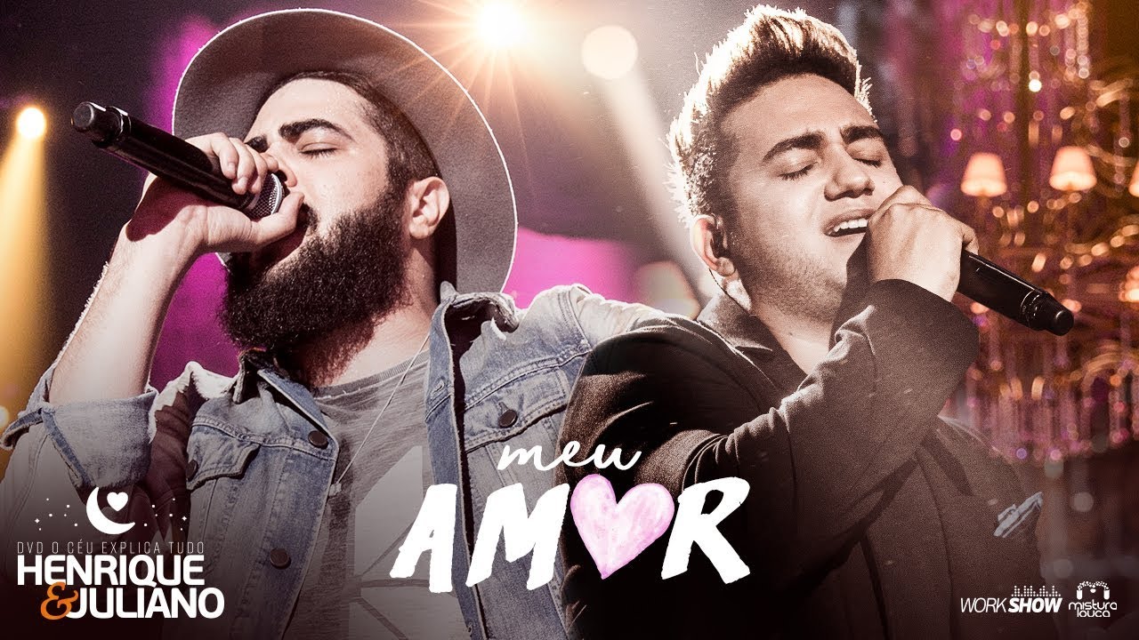 Artistas de música sertaneja raiz cantando em um palco ao ar livre, representando a essência da música country brasileira.