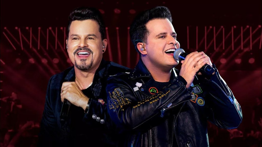 Duplas Sertanejas Famosas apresentando seus sucessos em um show ao vivo